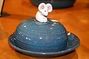 [Rackliffe Pottery's great little mouse topped cheese safe.]