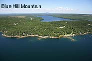 Aerial view of the Oakland House Seaside Resort waterfront, Walker Pond, Blue Hill Mtn. a bump on the horizon.